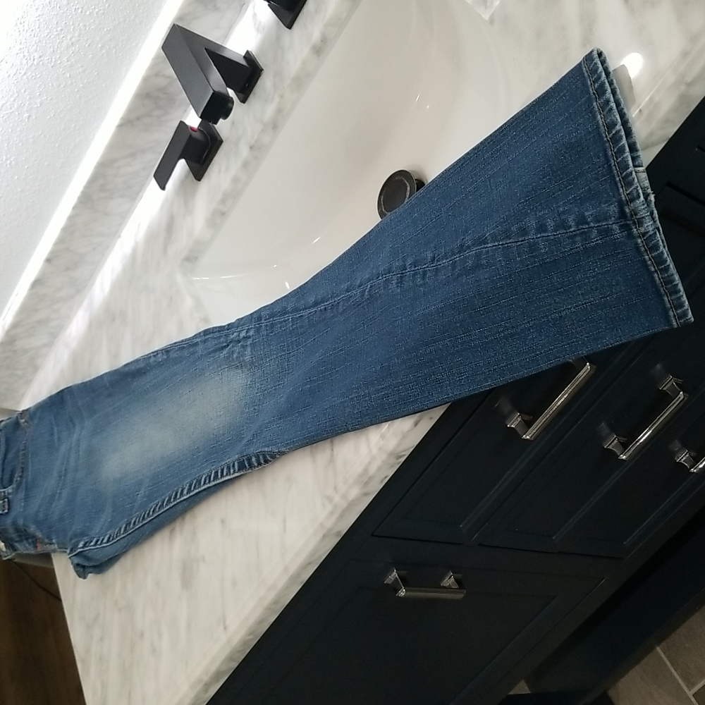 Girls True Religion blue Jean's, snap button closure. Size 14